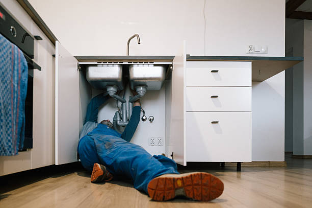 Professional Emergency Plumber technician working in Johnsburg, NY